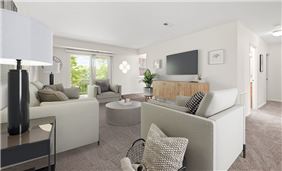 Living Room with Sliding Glass Doors Leading to Private Patio or Balcony (model furniture)