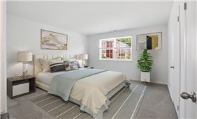 Spacious Bedroom with Extensive Closet Space (3-Bedroom Floor Plan with Model Furniture Shown)