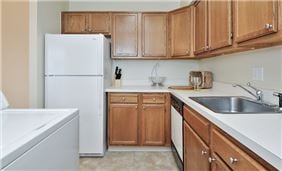 Classic Kitchen Style with Full-Sized Washer and Dryer
