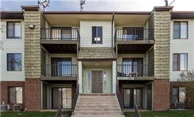 Apartment Building Exterior- Each Apartment Features a Spacious Covered Private Patio or Balcony
